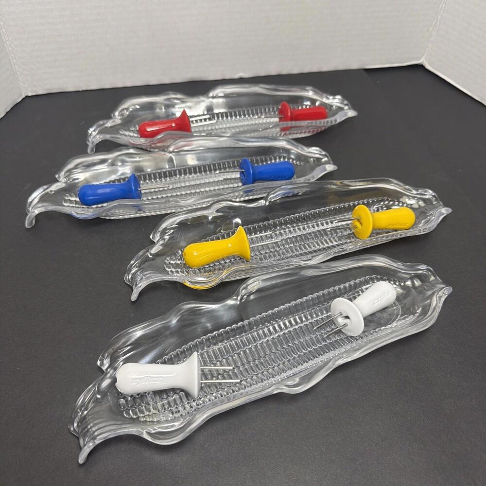4 Plastic Corn On The Cobb Serving Trays And 4 Sets Of Zyliss Cobb Holders